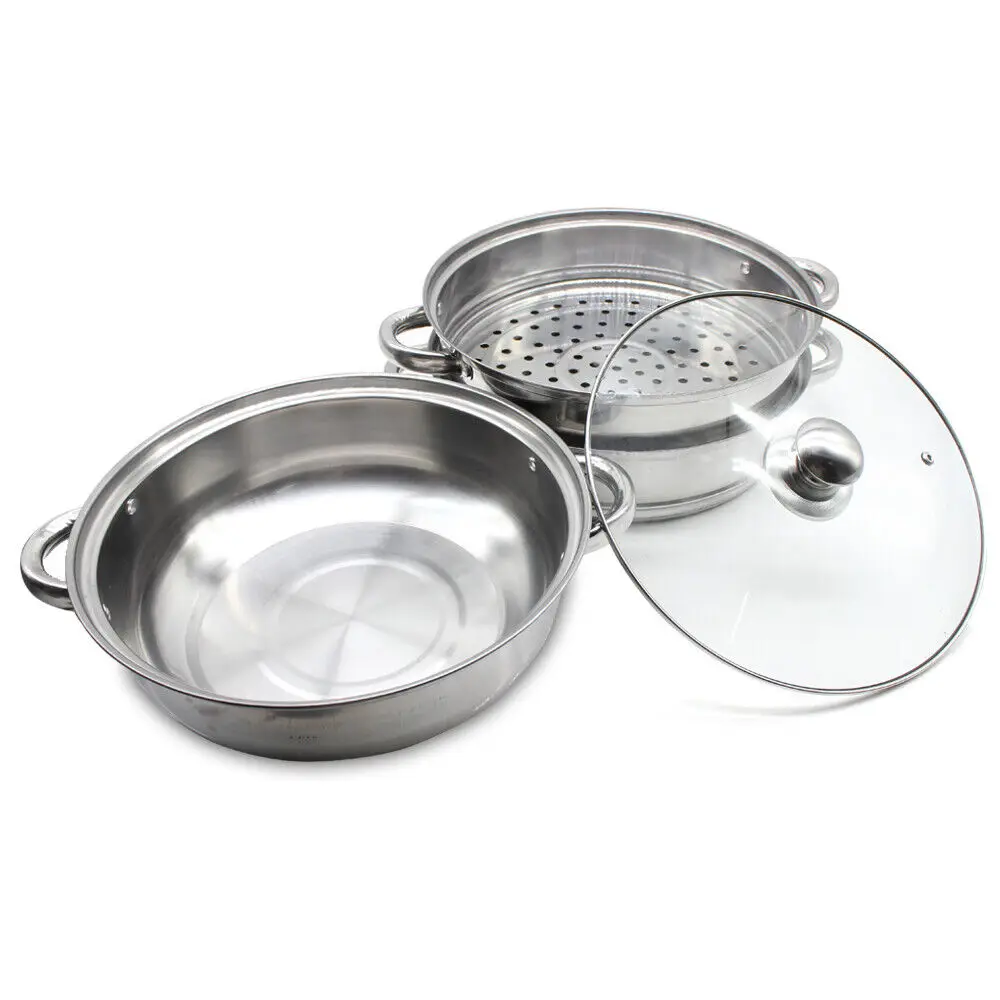 Stainless steel steamer with glass lid.