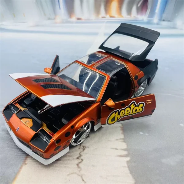 Orange Cheeto-themed toy car with open doors.