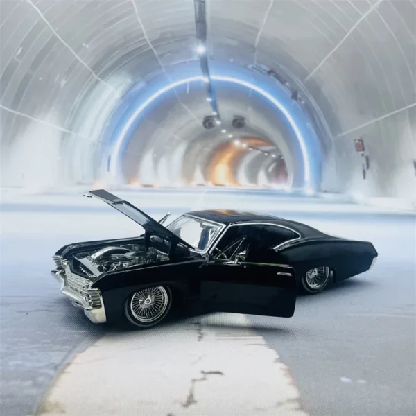 Black car with open hood in tunnel.