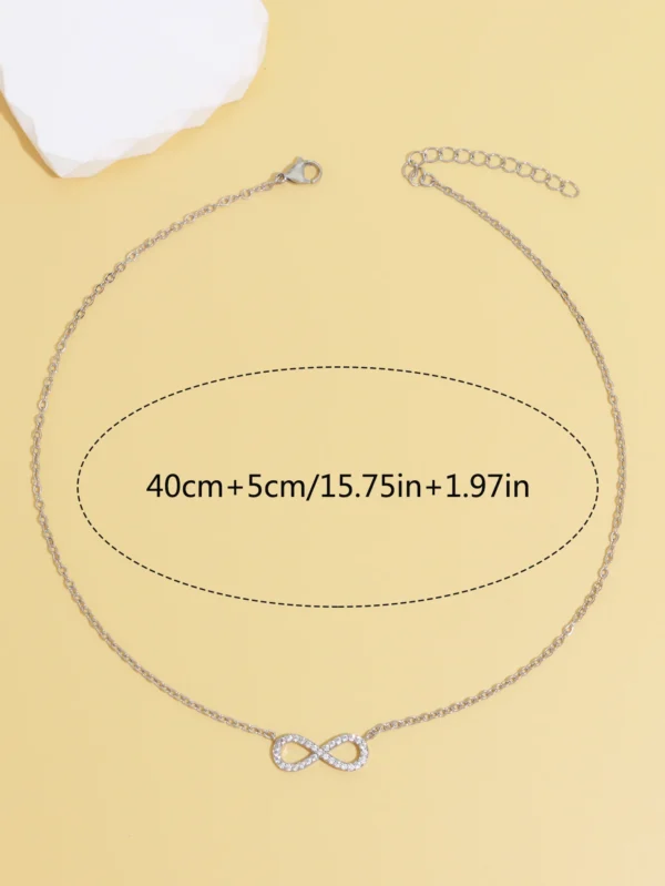 Silver infinity necklace with cubic zirconia.