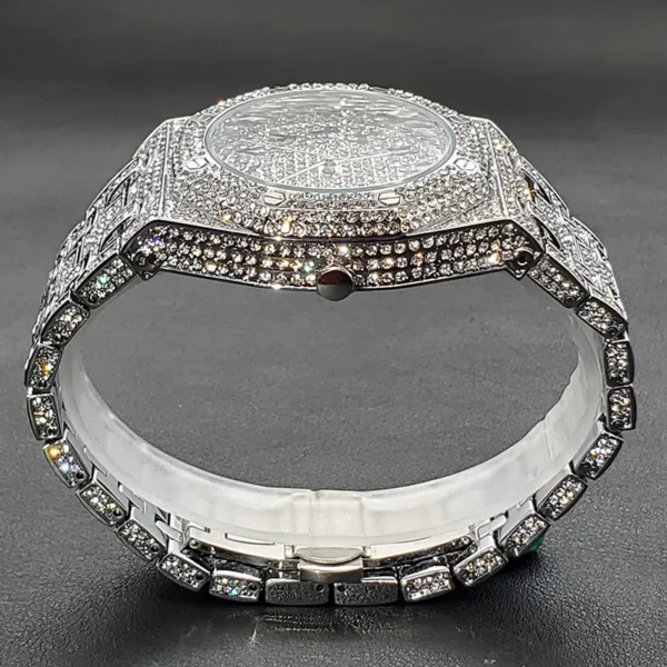 Diamond encrusted silver wristwatch.