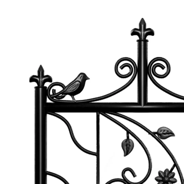 Black metal gate with bird and leaves.