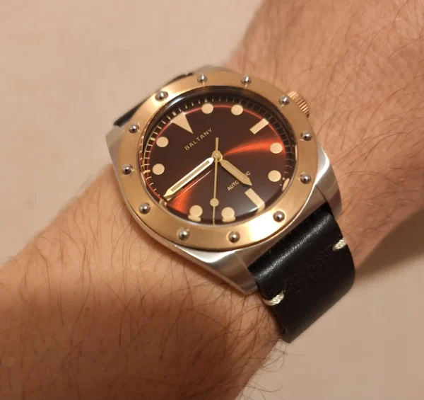 A Baltany wristwatch with a black band.