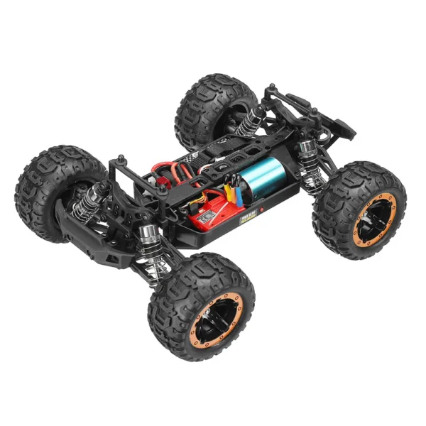 Black RC car chassis with orange wheels.