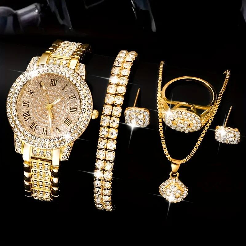 Gold jewelry set with diamond accents.