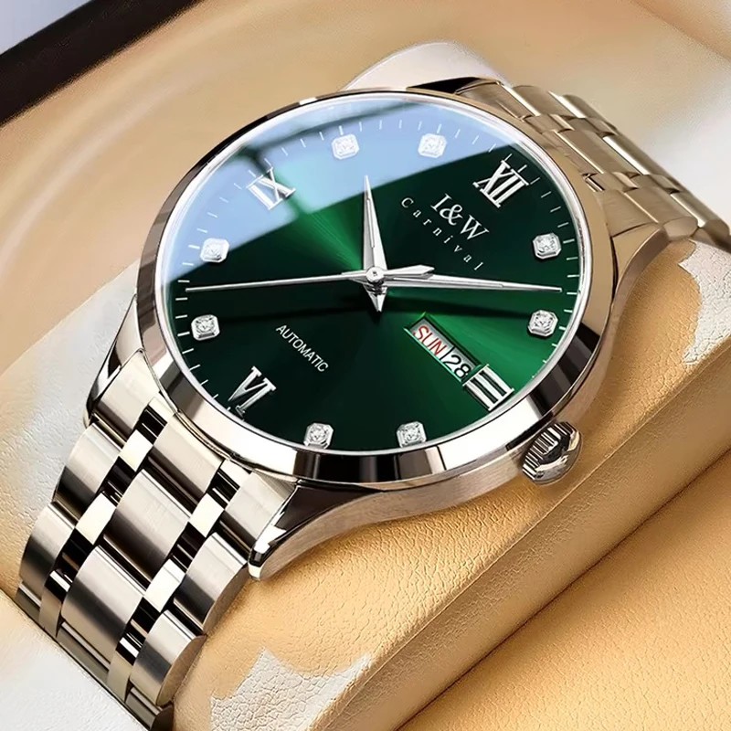 Silver and green automatic wristwatch.