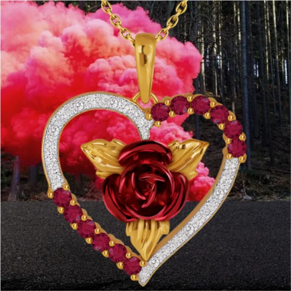 Gold heart pendant with red rose.