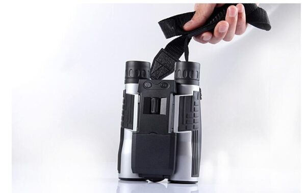 Black and silver binoculars with strap.